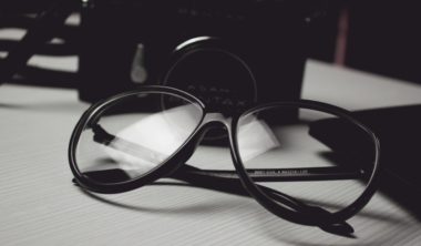 eyeglasses-with-camera-in-background